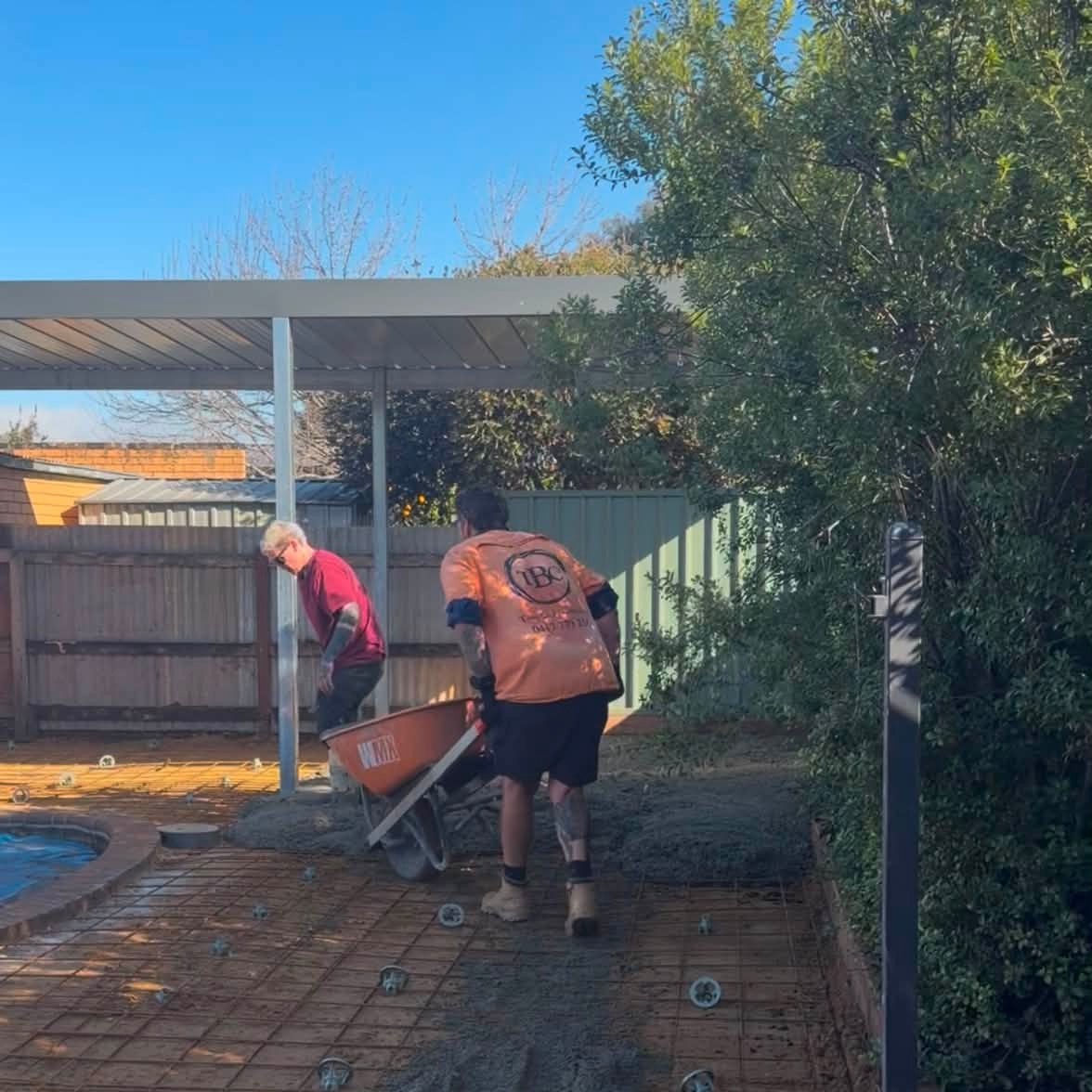 Site preparation and barrowing before a concrete pour